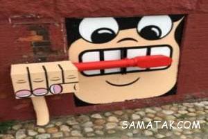 نقاشی های جالب خیابانی روی اماکن قدیمی 28 2034644517 samatak com