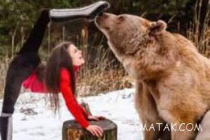 دوستی عاشقانه دختر 14 ساله با خرس نر + تصاویر 115 1892426615 samatak com